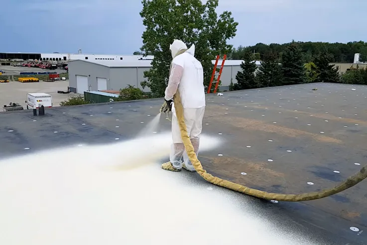 Spray foam roofing system applied to flat commercial roof in Pueblo