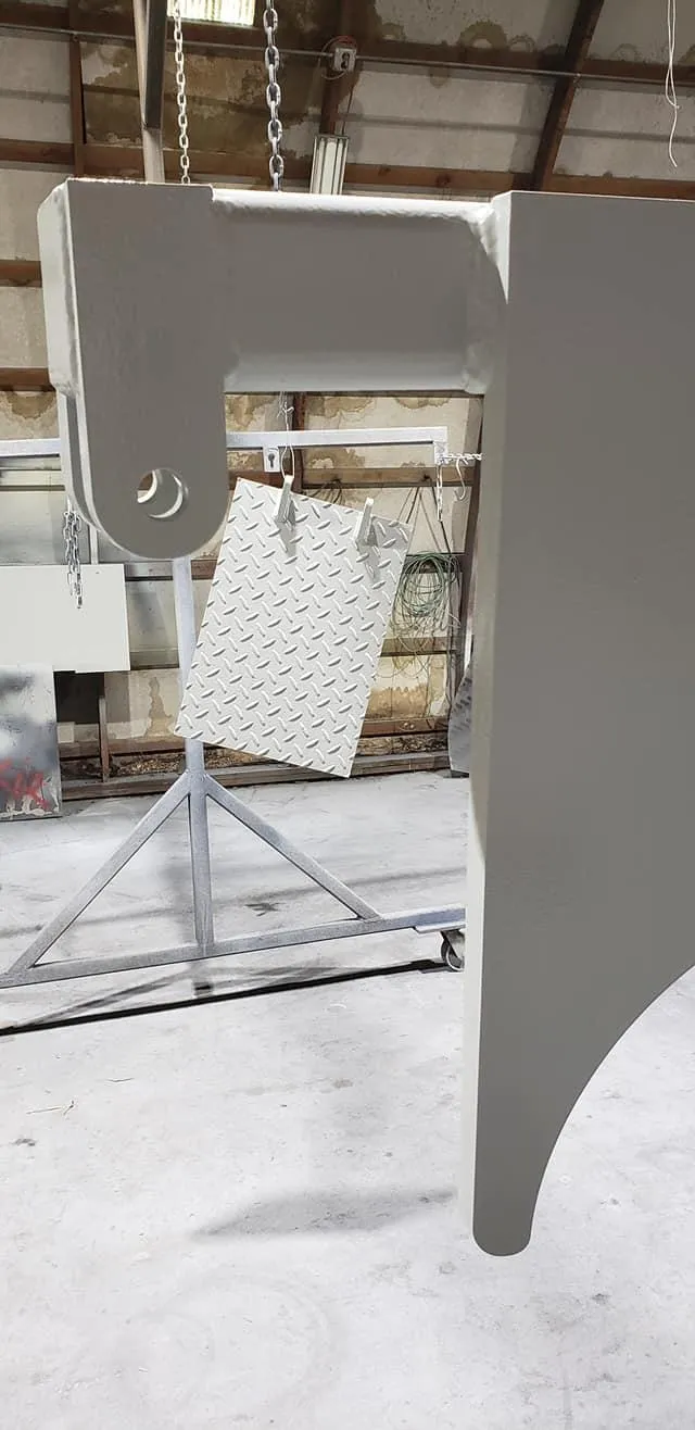 Why Powder Coating Lasts Longer Than Paint for Trailers, Gates, and Metal Parts