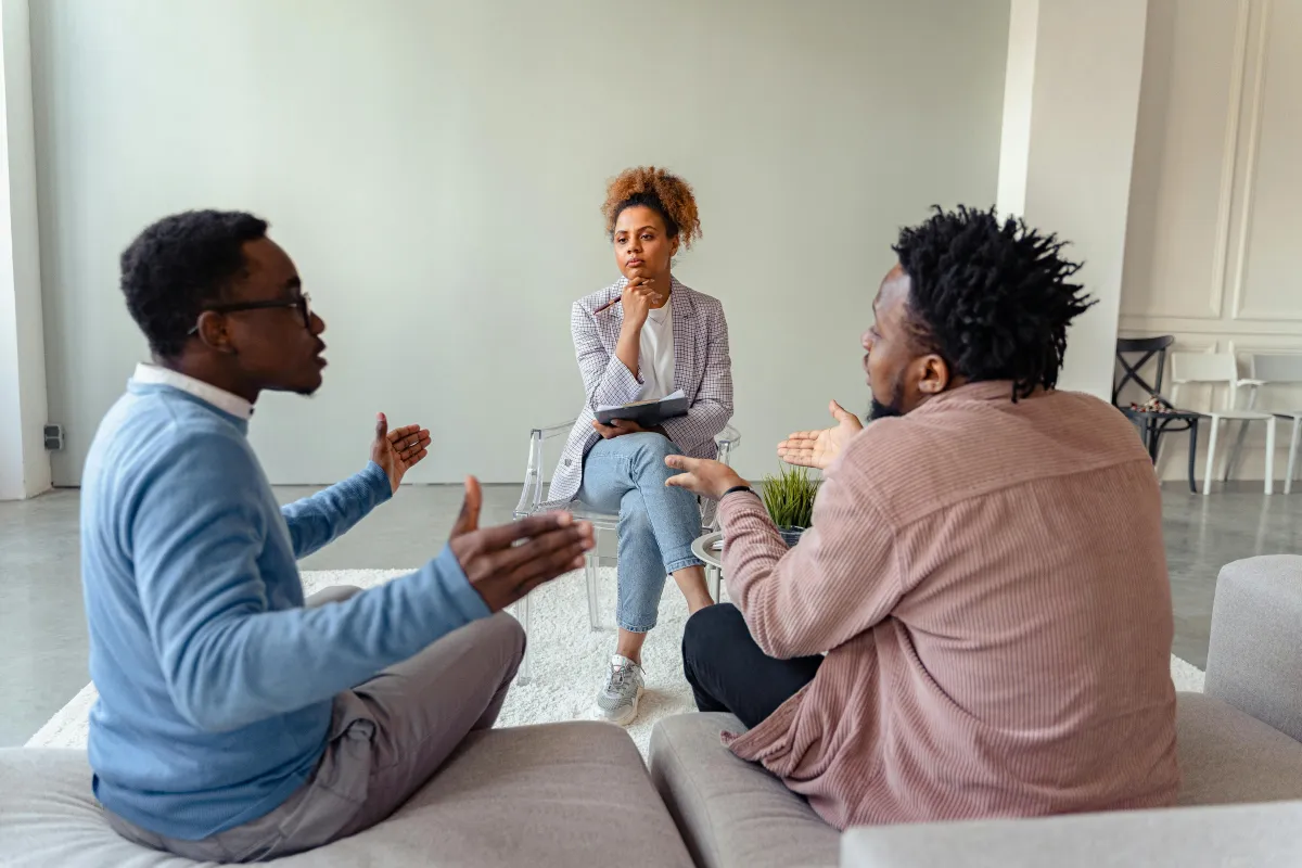 Mediator sitting with couple