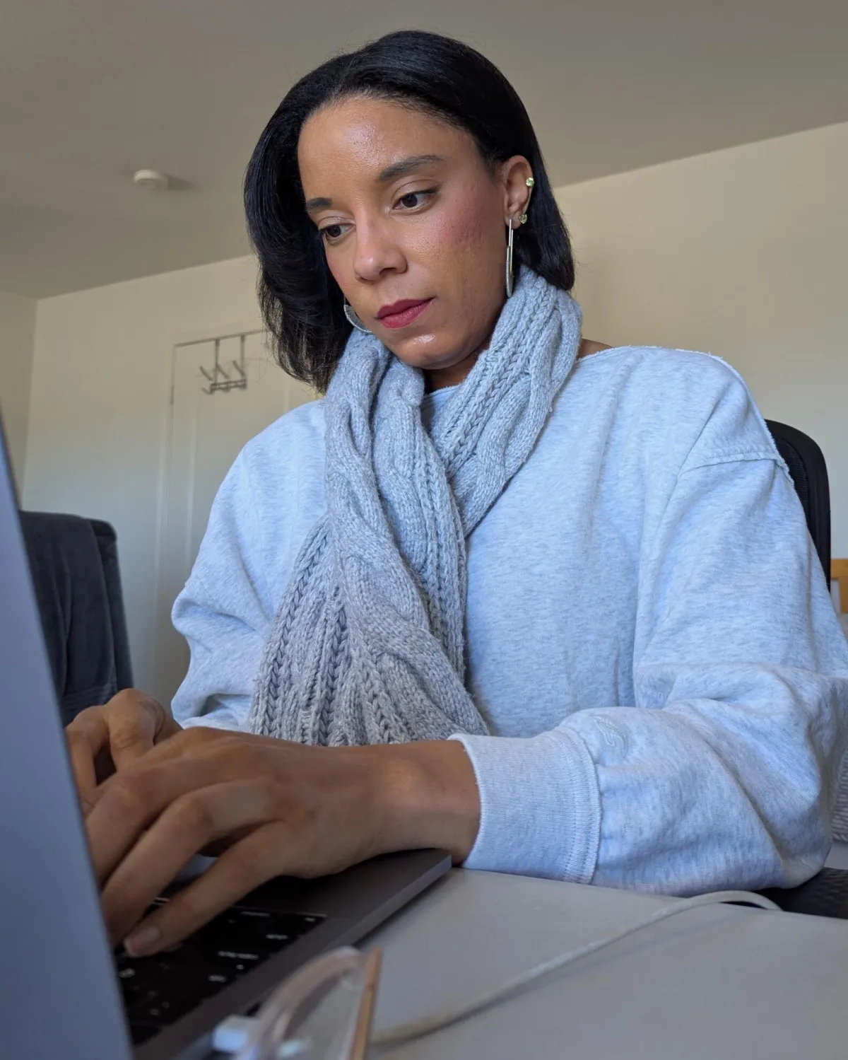 woman typing on computer