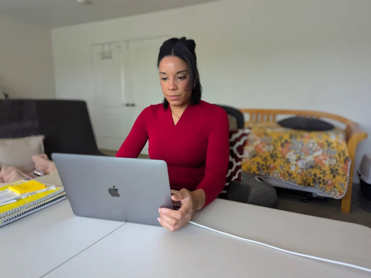 woman typing on computer