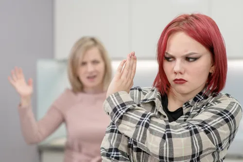 teen girls arguing with parents