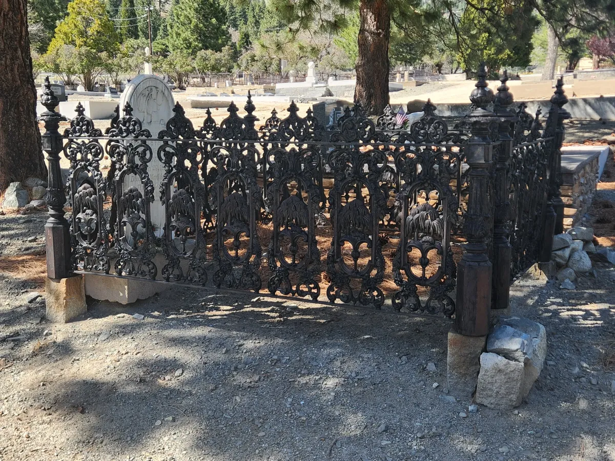 wrought iron fence at cemetery