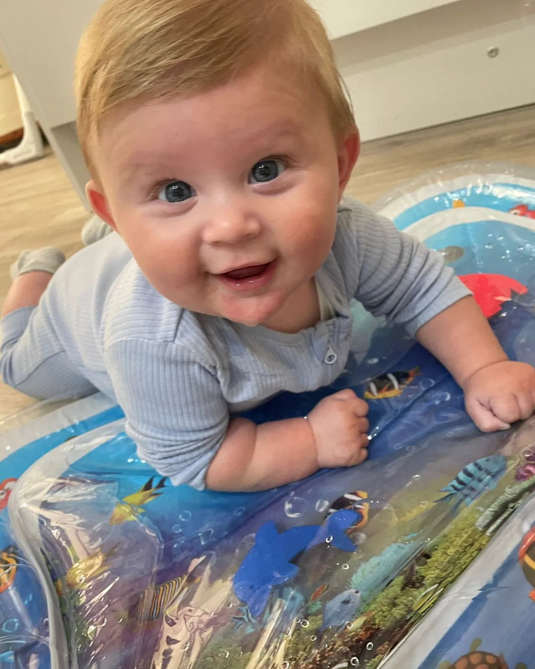 4 month old playing smiling