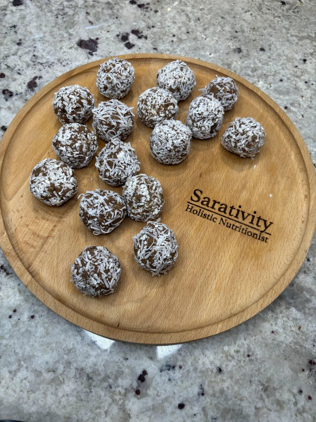 Energy balls on wooden plate