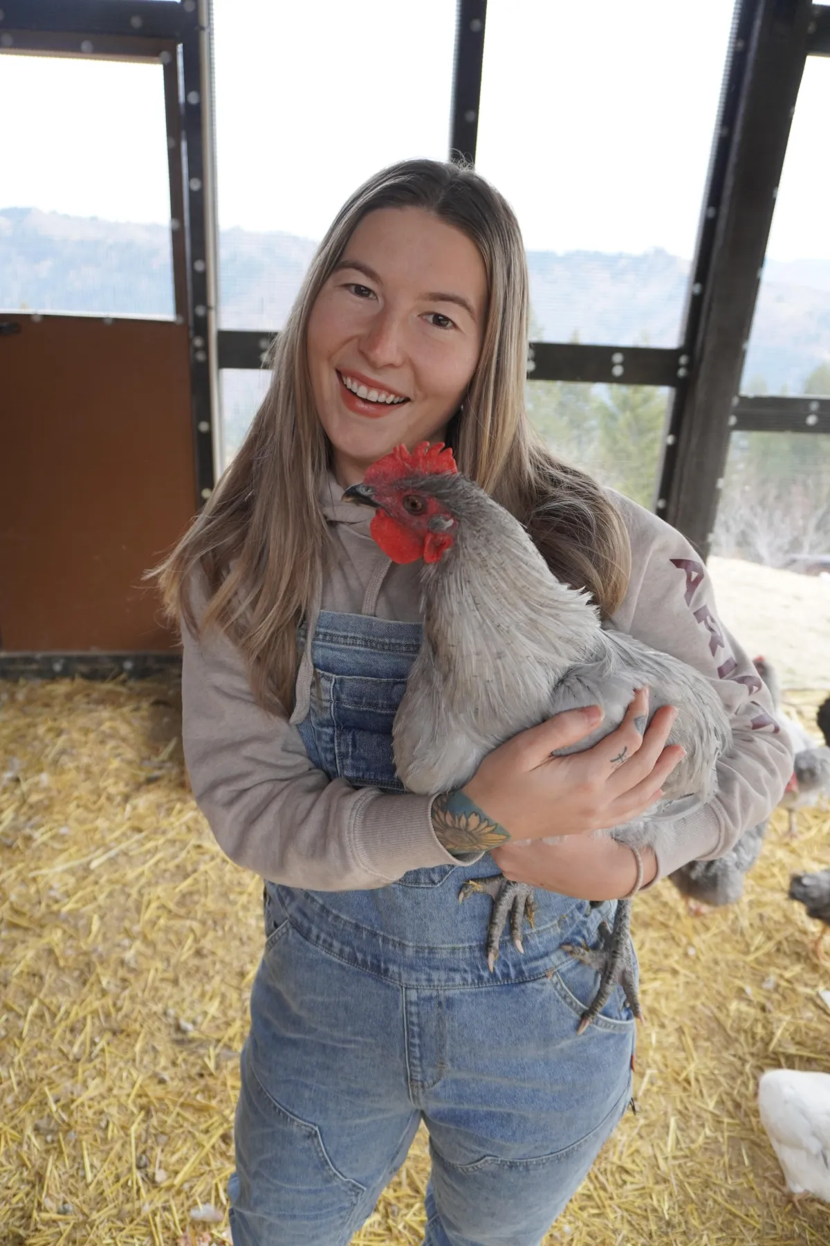 Woman holding chicken