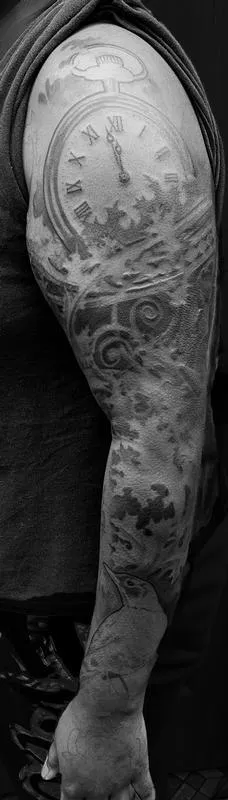 Bird and leaves tattoo