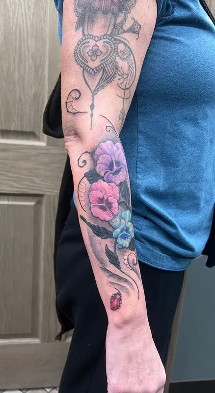 Flowers, gems, and ornamentals tattoo