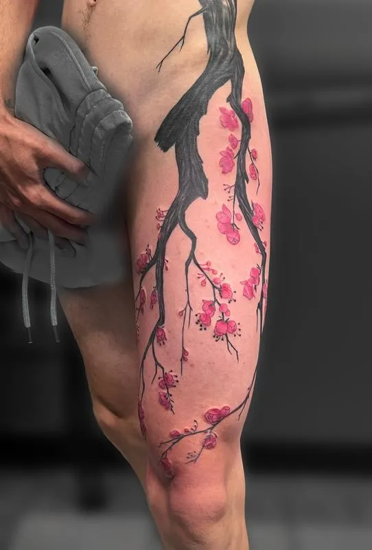 Cherry blossom branch tattoo