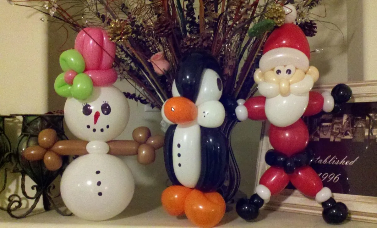 balloon twisting penguin, snowman, Santa clause