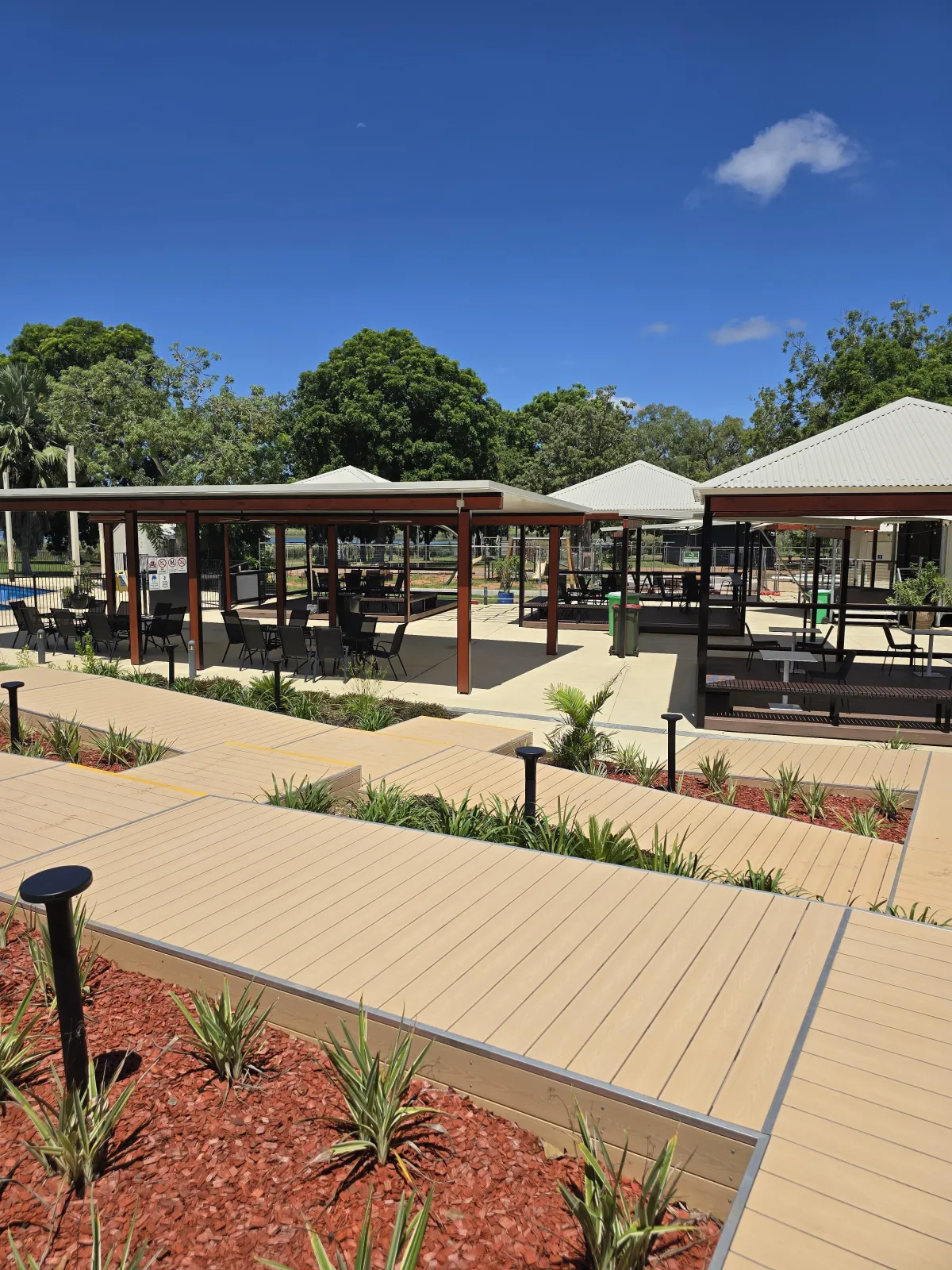 Outdoor path to Covered tables at Lilys Resort Kununurra