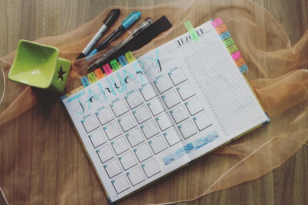 calendar with colorful page markers 