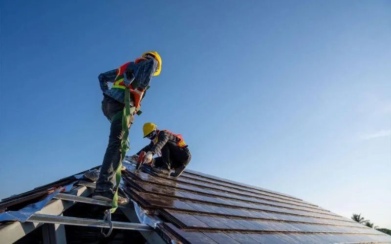 men conducting roof inspection in omaha