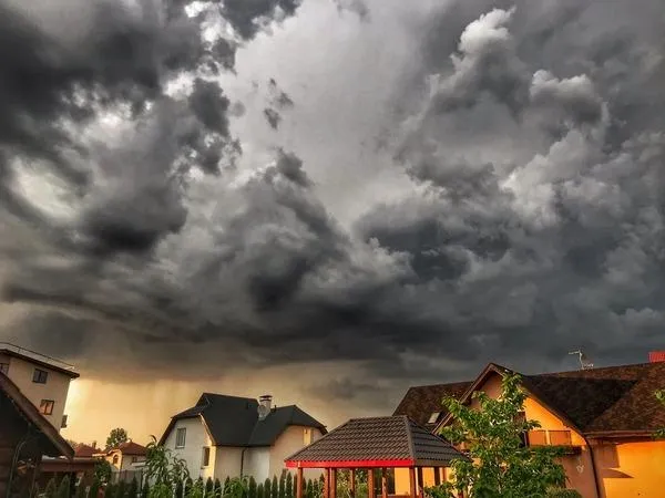 dark storm clouds looming over the sky
