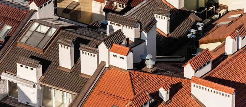 several roofs are directly hit by the sun's rays