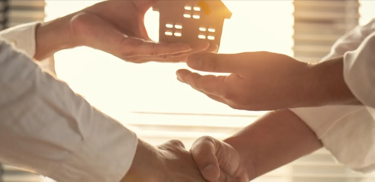 Service business owner explaining value-based pricing to a client
