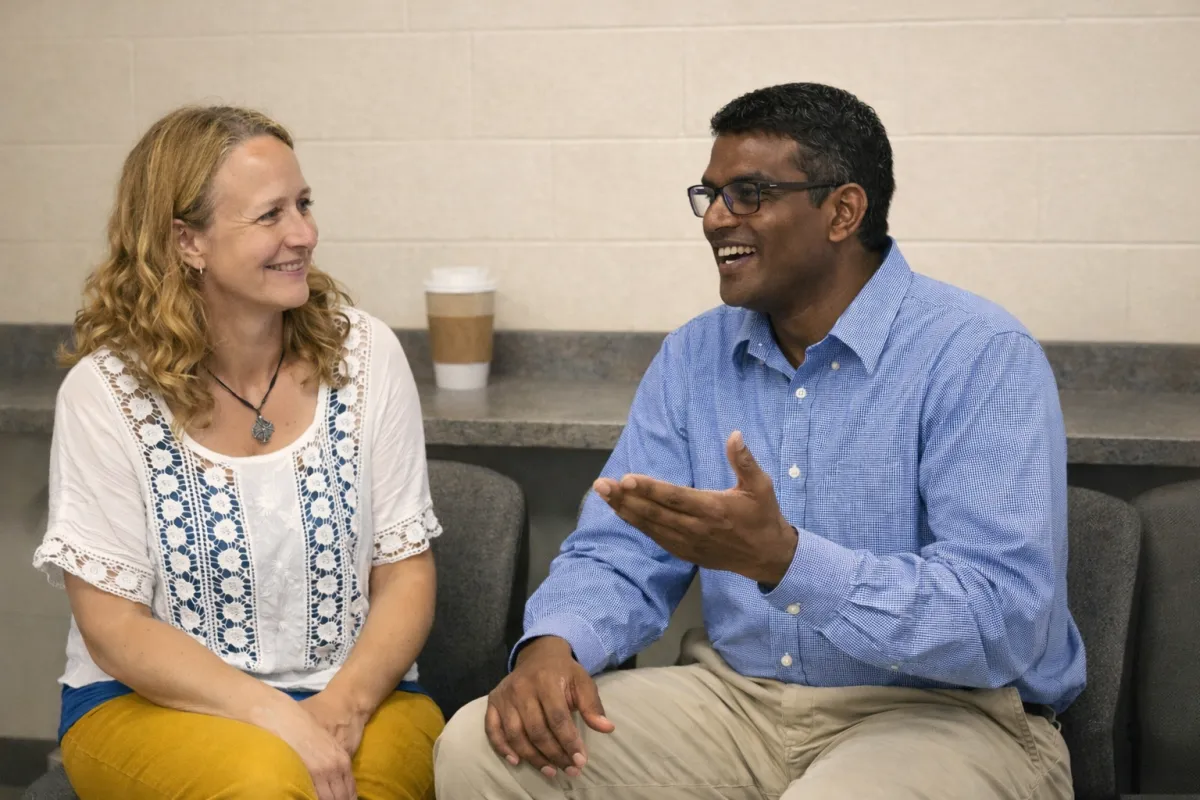 man and woman talking