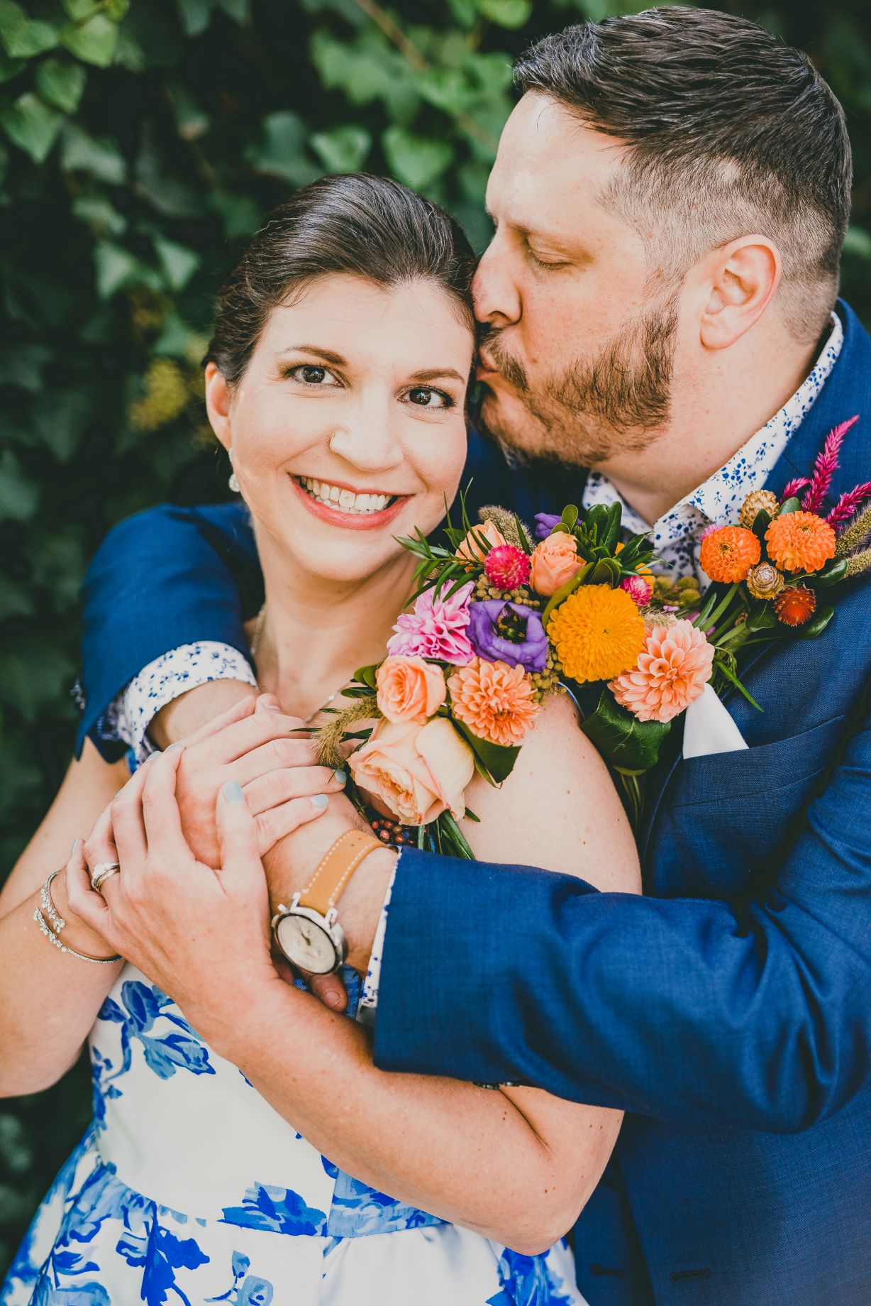 Bright fall colors and textures in an onver-the-shoulder corsage and boutonniere.