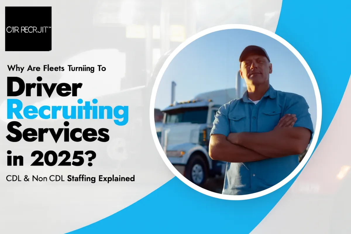 Driver standing in front of a truck while hands crossed.