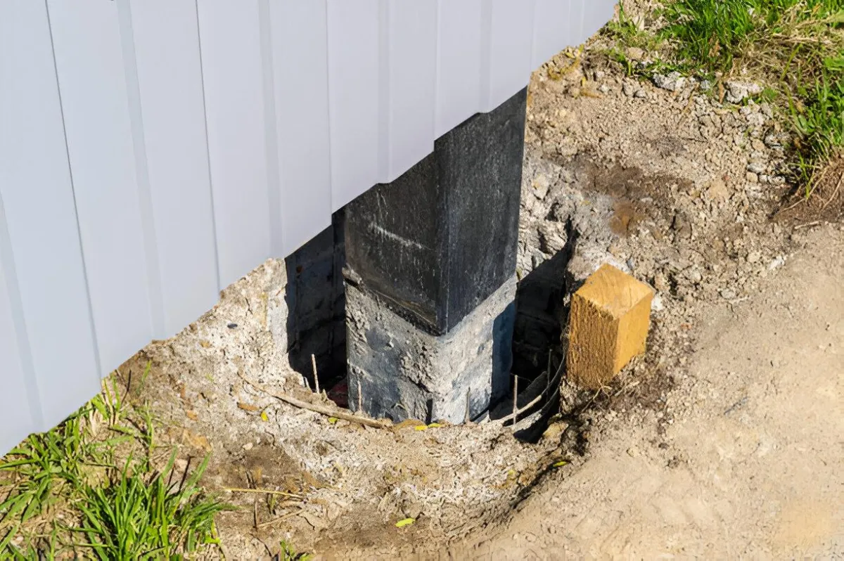Fixing a gate latch during fence repair Albany GA