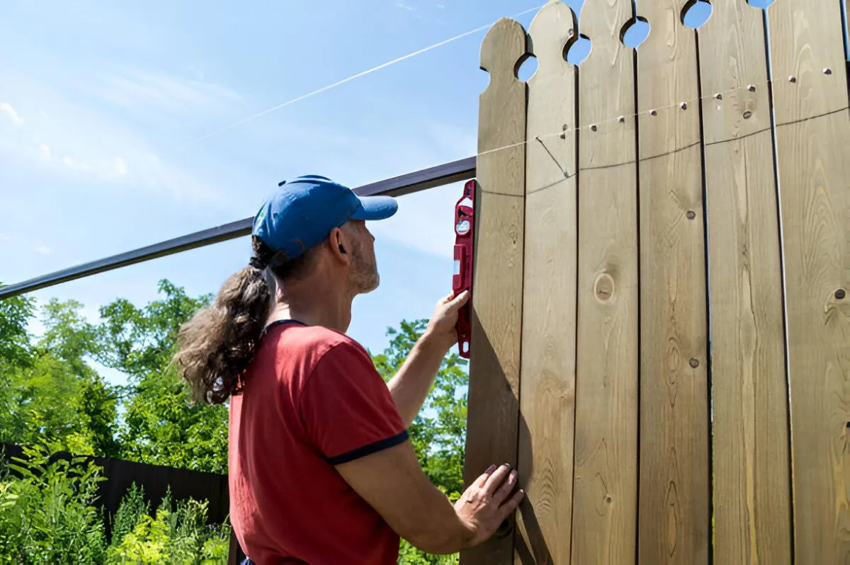 DIY vs professional wood fence installation comparison Albany GA