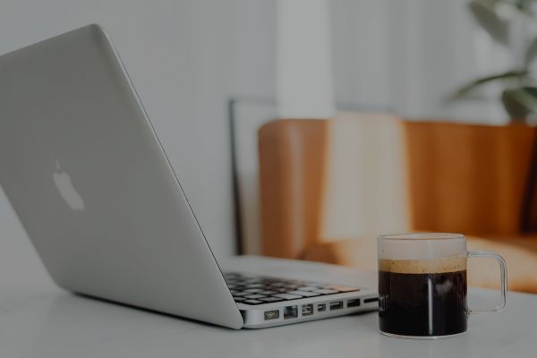 Calm, organised workspace representing professional short-term rental management and reduced landlord stress