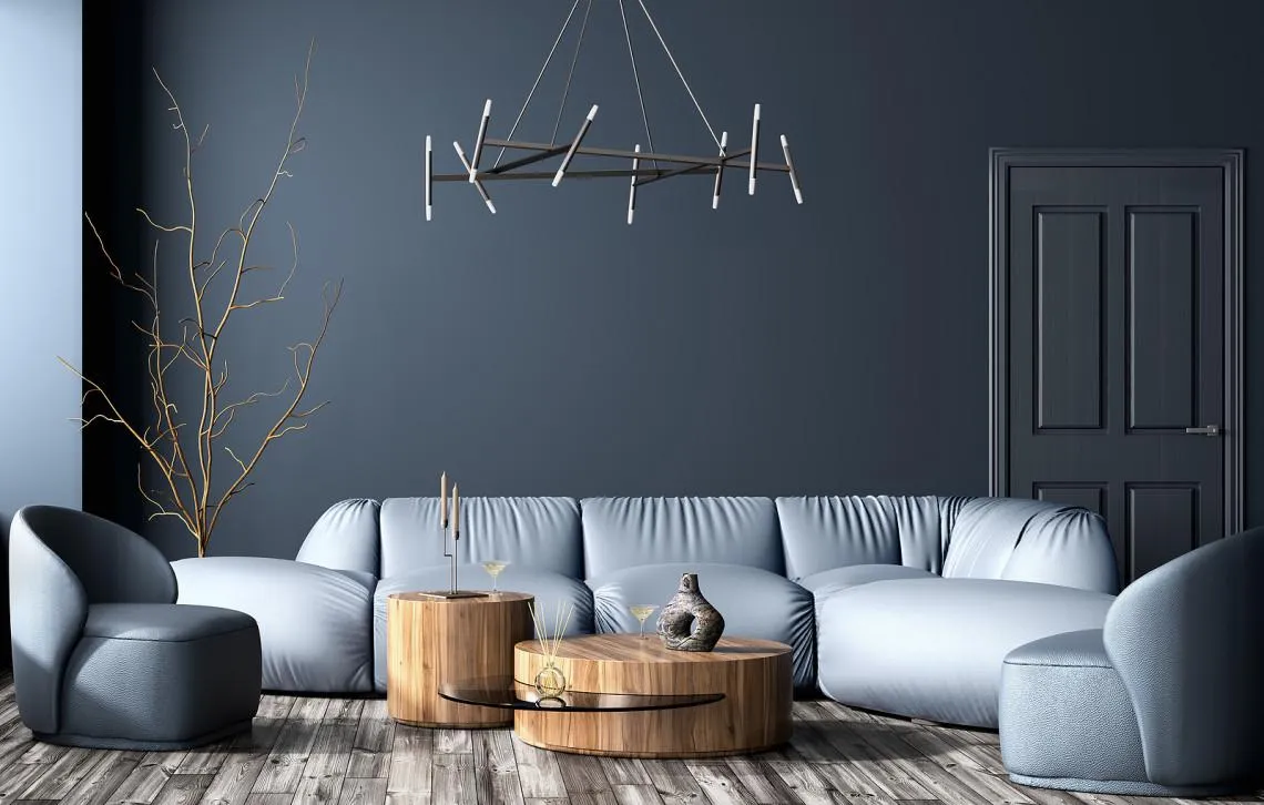 Modern home interior featuring bold kitchen, curved furniture, and a vibrant color palette