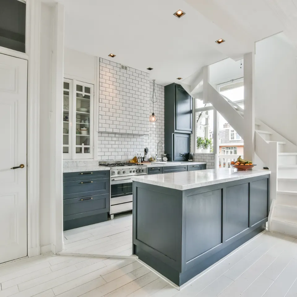 Bright, clean home interior with open curtains, neutral walls, and minimal furniture staged to impress buyers.
