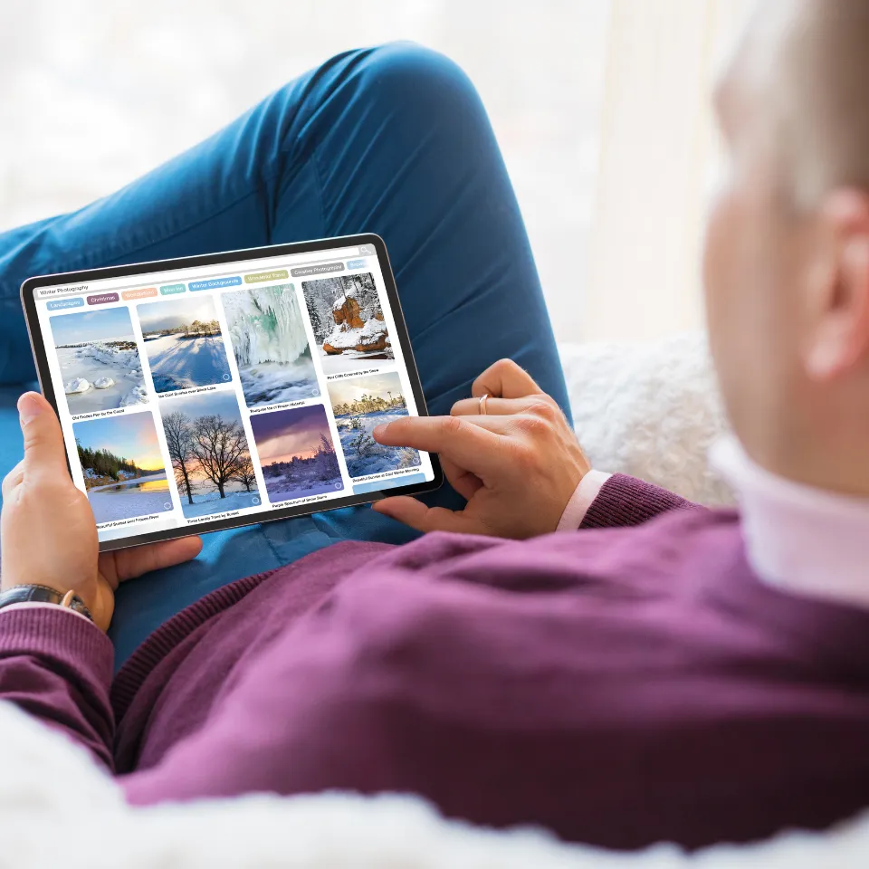 Homebuyer in fall or winter setting, browsing listings with seasonal advantages highlighted.