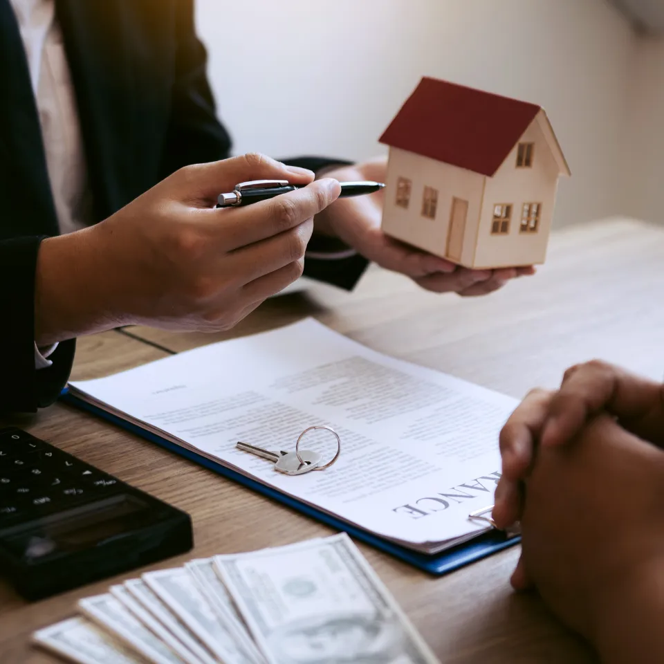 Illustration of a diverse family reviewing home financing options for affordable housing