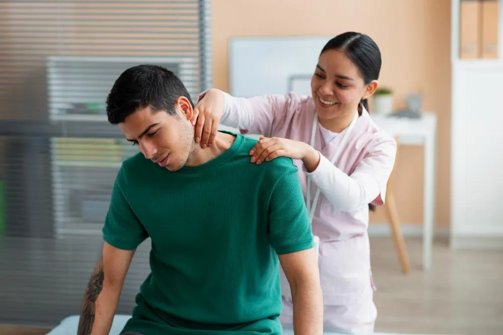 Doctor helping patient during rehabilitation