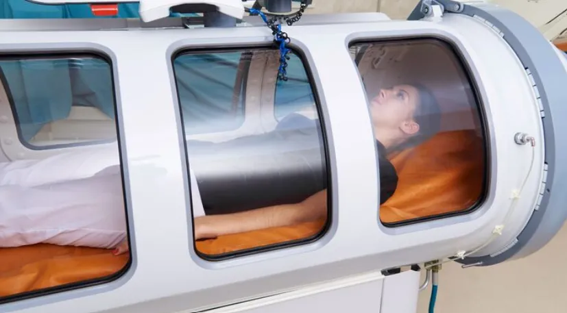 A hyperbaric chamber with a patient.