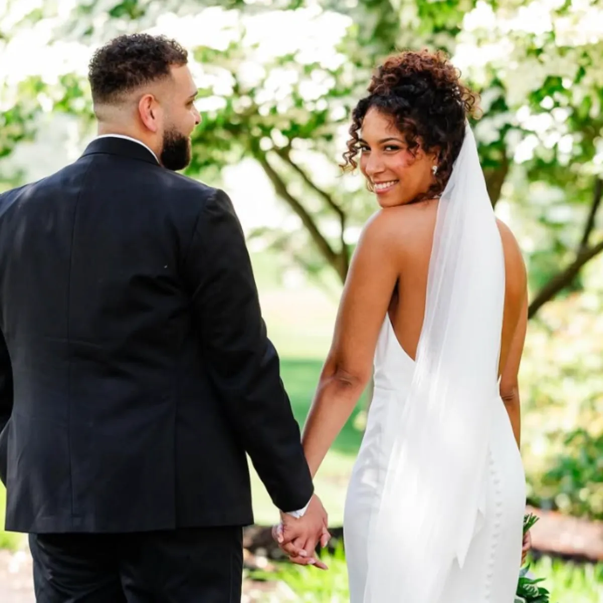 Bride with elegant wedding hairstyle created by a Lancaster PA bridal hair artist