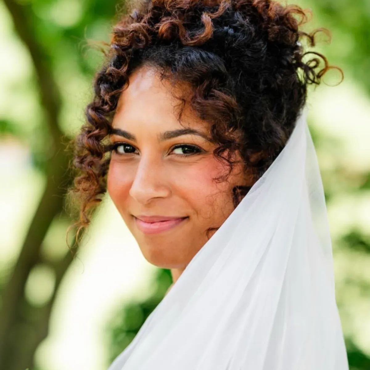 Natural bridal makeup and soft hairstyle created for a Lancaster PA bride