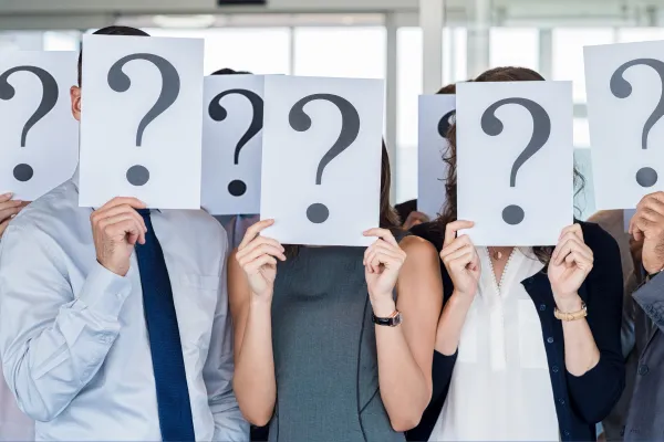 Unceratin workers with question marks