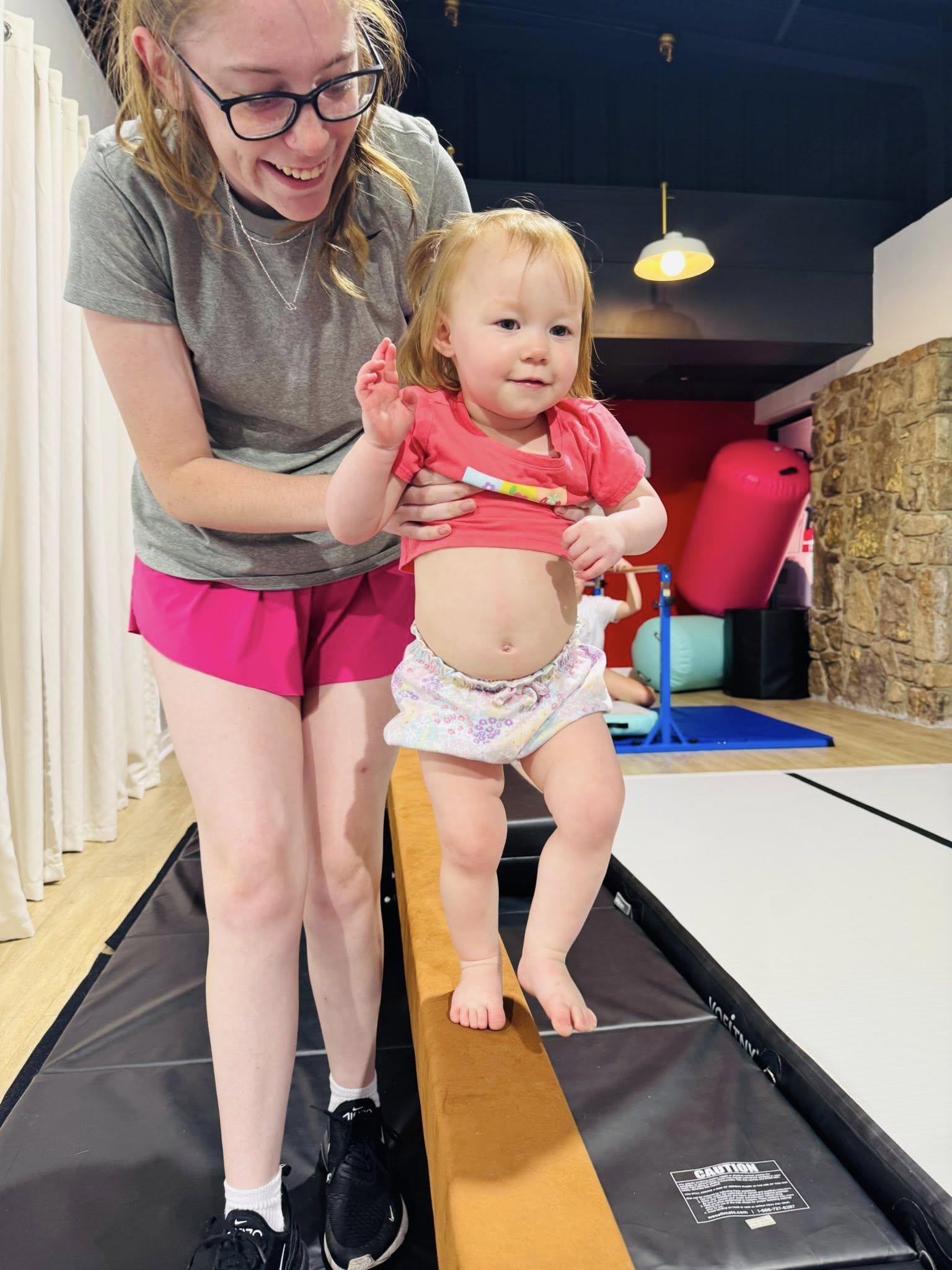 Toddler participating in individual instruction from CADC Instructor  
