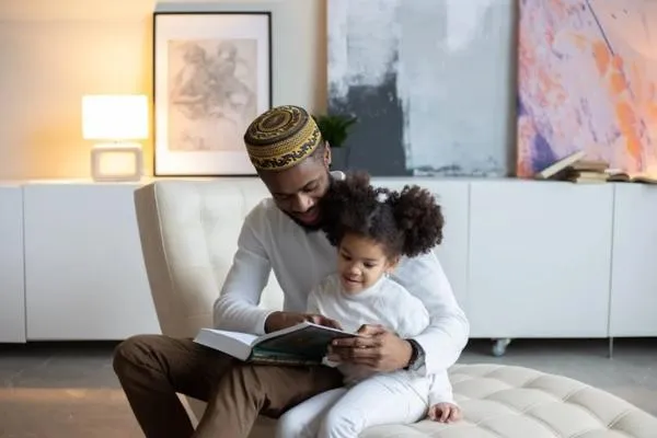 a man and a child sitting