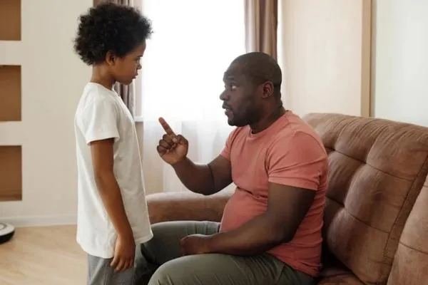 a father and his son talking
