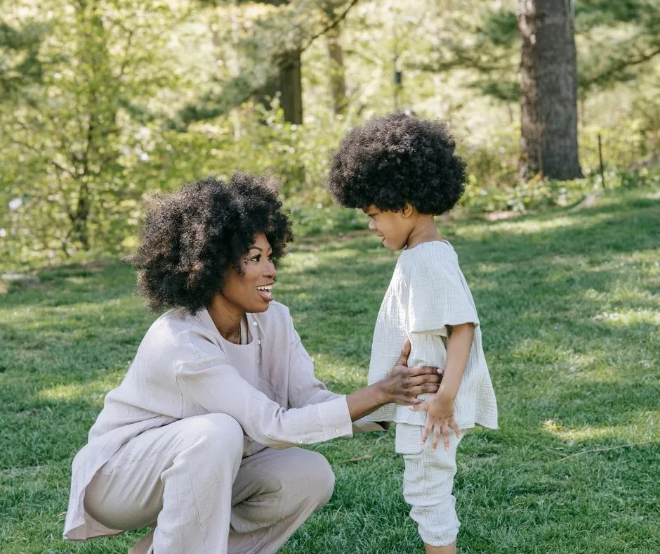 a mother talking to a child