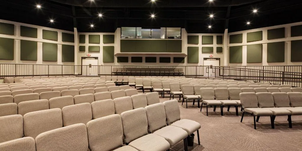 A large, empty worship auditorium in a church.