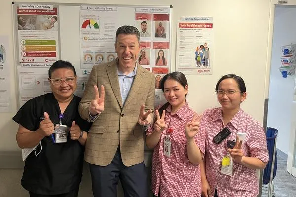 Barton with Filipino nurses on the ward
