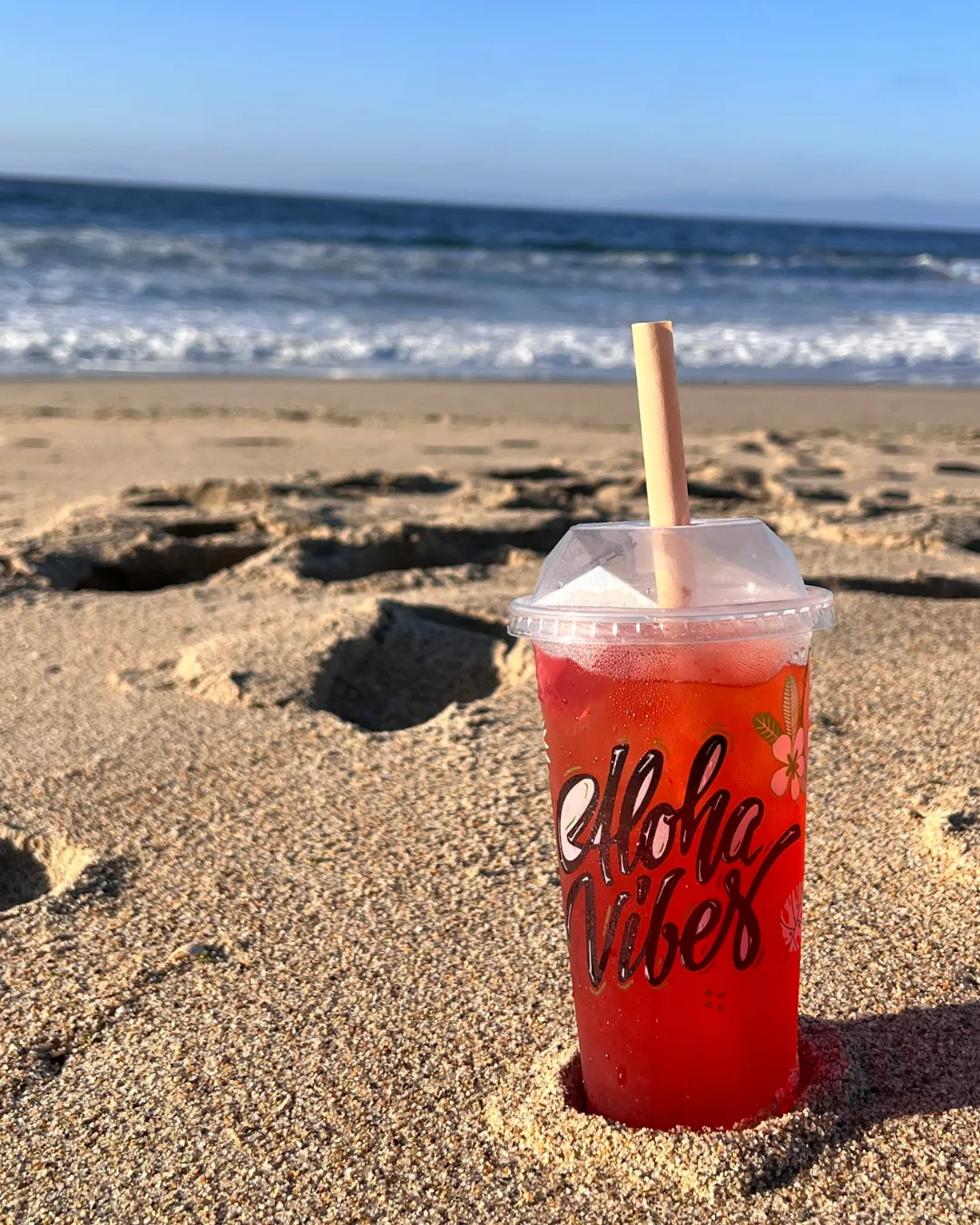 Enjoying tropical flavors of Lilikoi Boba at Seaside Beach