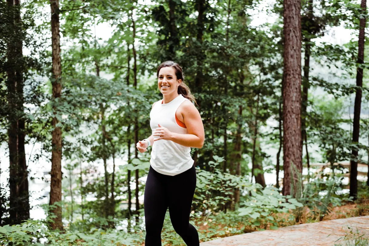 Logan running in the forest