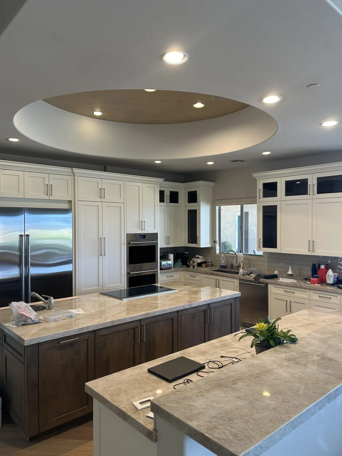 Taj Mahal natural quartzite countertops and custom cabinets for Scottsdale custom home.