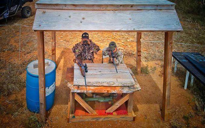 hunters with axis deer