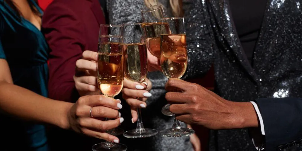 People toasting with glasses of champagne