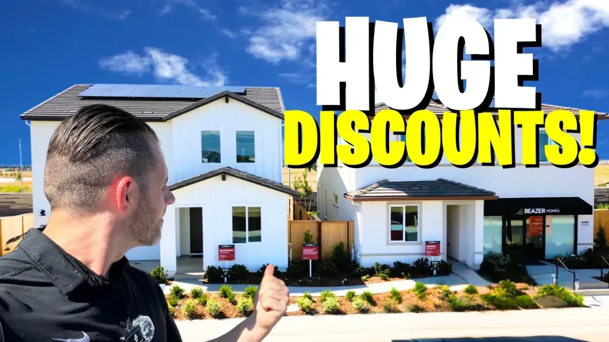 Lance pointing to the house