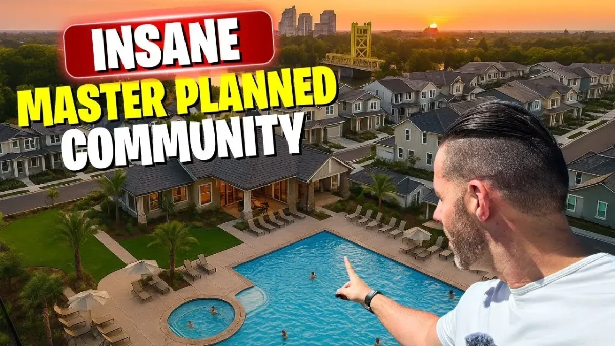 Lance pointing at the Luxury House