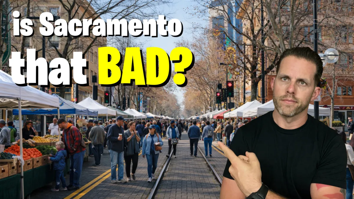 Lance in front of KStreet pointing at a sign