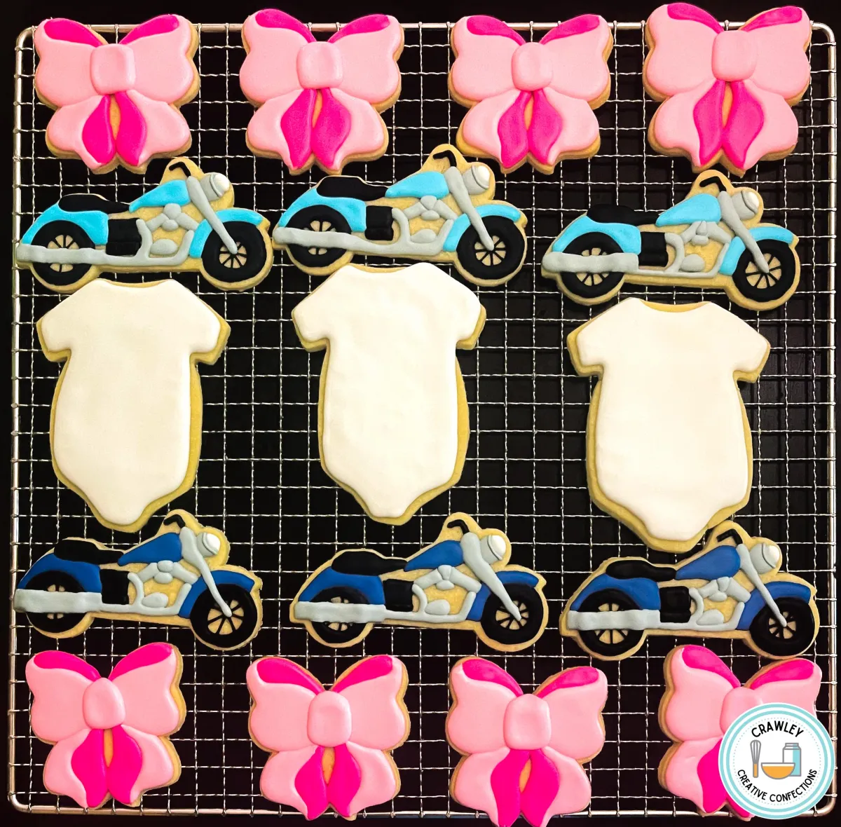 A playful set of sugar cookies for a “Bows or Bikes” gender reveal, featuring pink bows and blue motorcycles. Each cookie is hand-iced with vibrant colors and intricate details, perfectly capturing the fun and excitement of the celebration theme.